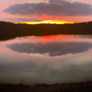 A romantic sunset reflecting off of a heart-shaped lake.