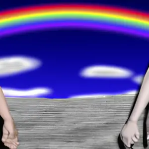 A couple holding hands, embracing, with a rainbow in the background.